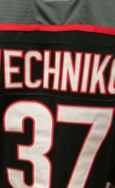 свитер хоккейный Carolina Hurricanes №37 SVECHNIKOV