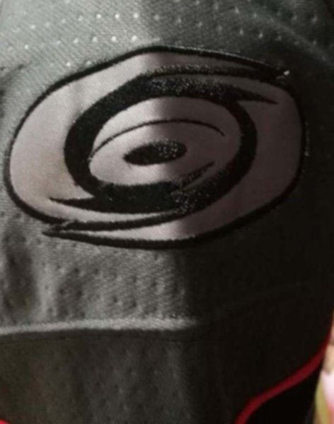 свитер хоккейный Carolina Hurricanes №37 SVECHNIKOV